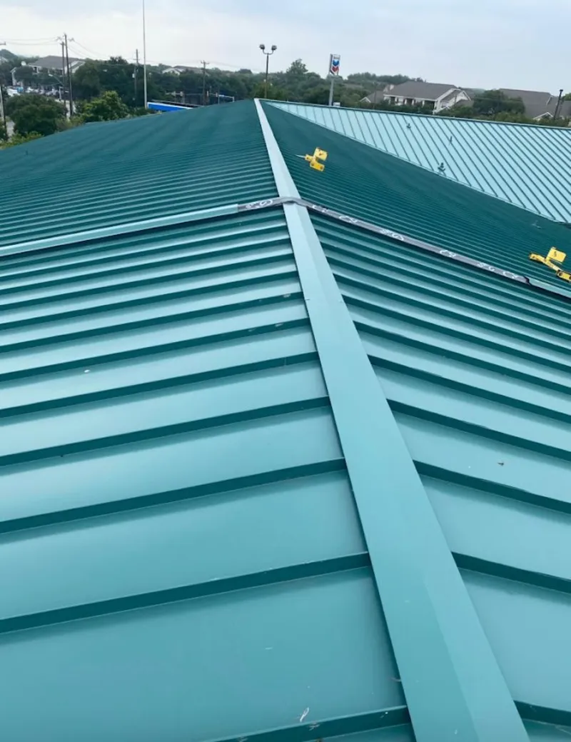 Green commercial metal roof ridge and valley for Metal Roof Repair in Modesto